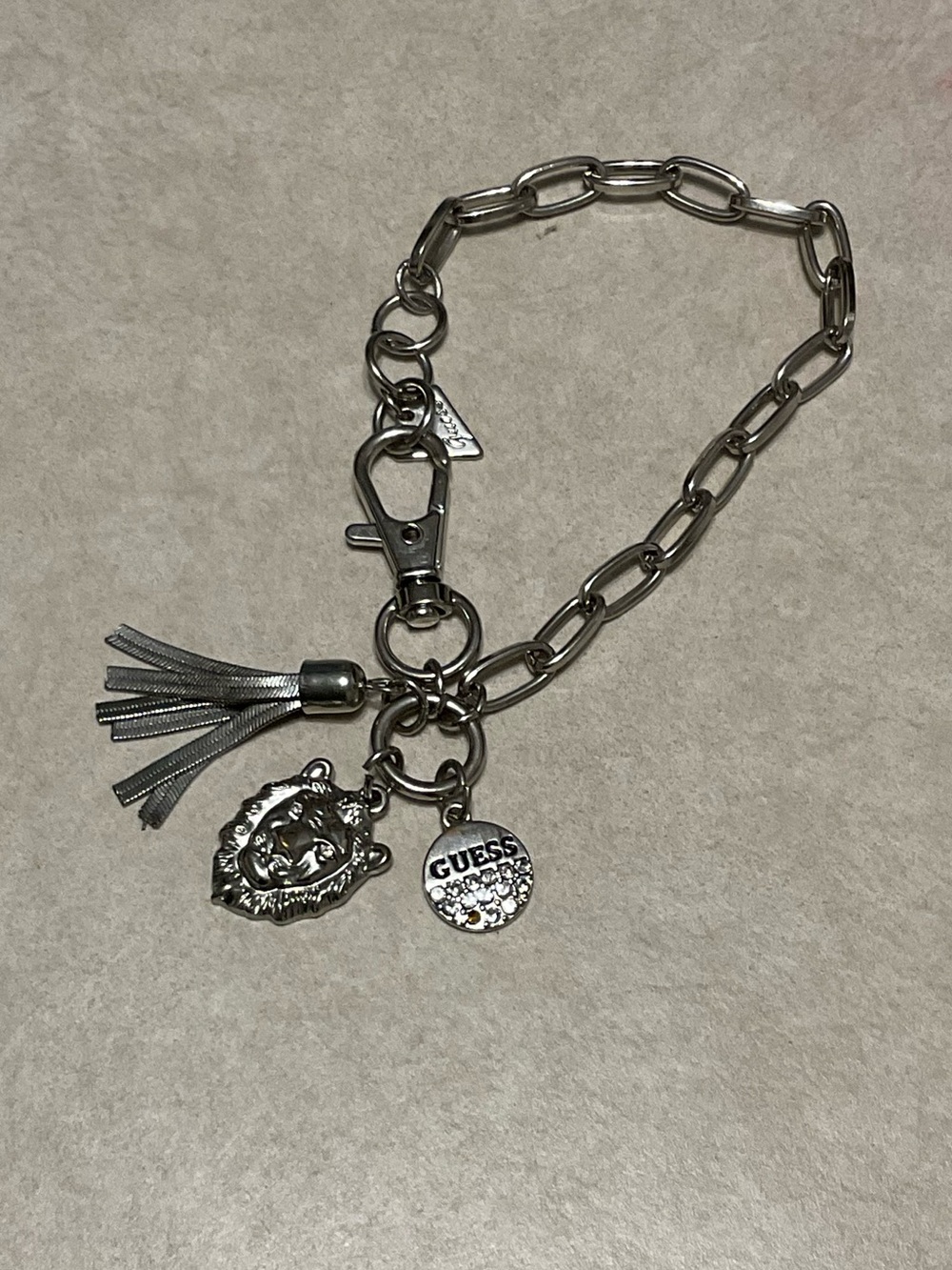 Guess Silver-Tone Charm Bracelet, one size fits most, like new!